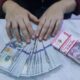 China Tarik Dolar Amerika Serikat dari Organisasi luar Negeri, Rupiah Diprediksi Meroket