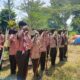 Anggota Pramuka melakukan penghormatan dalam kegiatan Dianpinsat.