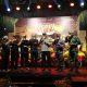 Sejumlah orang sedang menikmati secangkir kopi dalam suasana Festival Ngopi Sepuluh Ewu di Desa Kemiren, Banyuwangi.