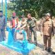 Peresmian pembangunan sumur bor dan sarana air bersih di Dusun Tugurejo, Desa Tegalrejo, Kecamatan Tegalsari, Kabupaten Banyuwangi. Tampak Danramil 0825/04 Genteng, Kapten Arm Sutoyo, dan sejumlah pejabat terkait lainnya.