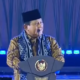 Presiden Prabowo Subianto sedang berpidato dengan mimik serius.