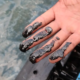 Limbah oli hitam menggenang di dermaga dan pasir Pantai Bangsring Underwater