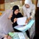 Petugas desa mengurus dokumen kependudukan bagi warga kurang mampu