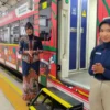 Penumpang memadati Stasiun Madiun saat angkutan Lebaran 2026