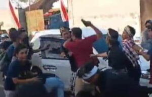 Pria berbaju merah diduga acungkan pistol