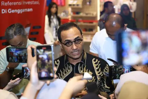 Ilustrasi papan perdagangan saham terkait kasus manipulasi harga saham oleh OJK