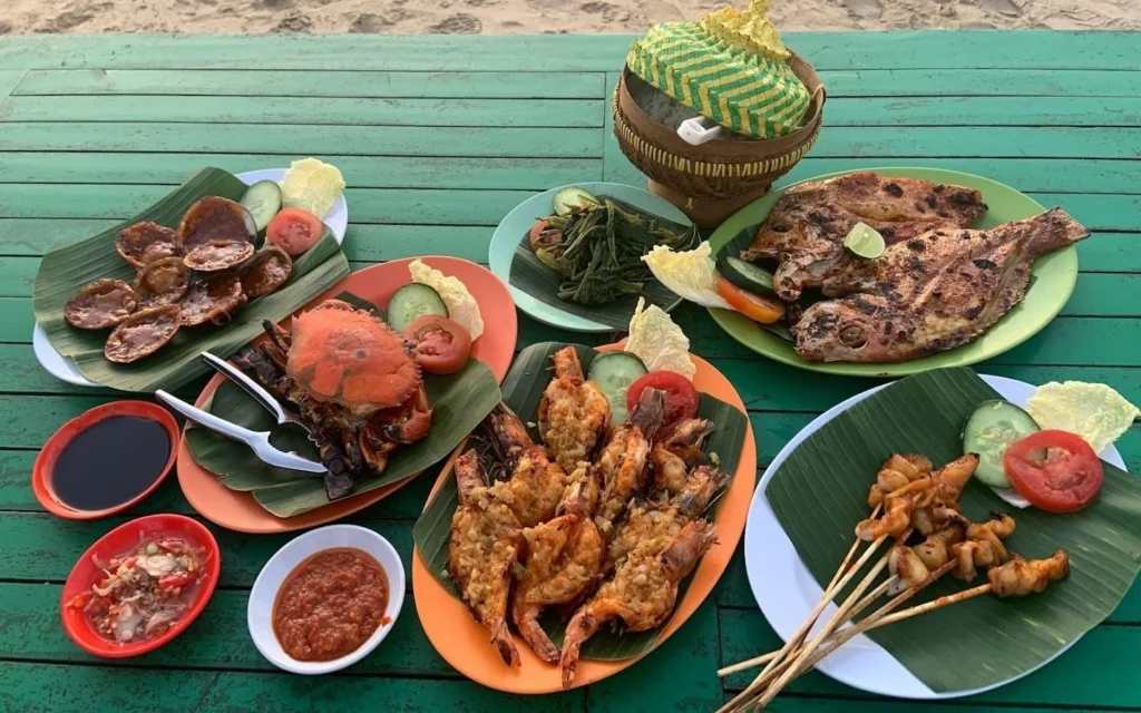 Menu khas yang wajib dicoba di tempat makan seafood terdekat Pantai Marina Boom Banyuwangi