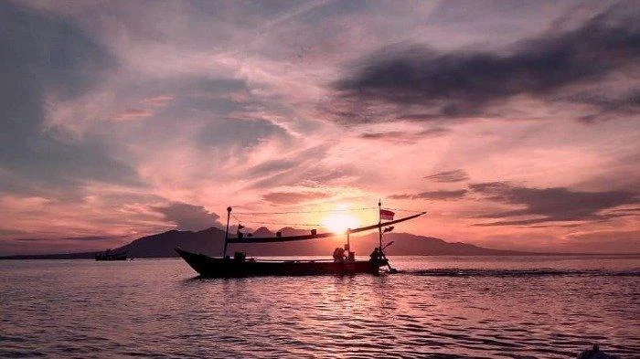 Sunset terbaik di Pantai Boom: Spot yang wajib dikunjungi