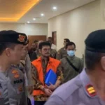 DPO Narkoba Andre The Doctor Tiba di Bareskrim, Tangan Diborgol dan Kaki Diperban