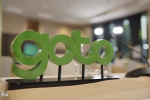 Menakar Gerak Saham GOTO Usai Balik Rugi Jadi Laba, Target Harga dan Risiko Investor