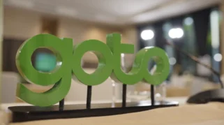 Menakar Gerak Saham GOTO Usai Balik Rugi Jadi Laba, Target Harga dan Risiko Investor