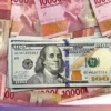 Kurs Dolar AS Tembus Rp17.700, Rupiah Tertekan di Tengah Ketegangan Global dan Tantangan Ekonomi Domestik