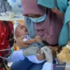 Pelukan Ibu dan Upaya Meningkatkan Imunisasi Anak di Banda Aceh