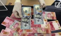 Rupiah Ditutup Melemah di Rp17.706 per Dolar AS, Sentimen Perang AS-Iran Jadi Pemicu