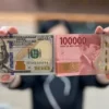 Pelemahan Rupiah Cerminan Sentimen Negatif Pasar Global, Tembus Rp18.023 per Dolar AS
