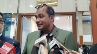 RUU Polri Disahkan: Wamenkum Ungkap Alasan Penetapan Usia Pensiun 60 Tahun