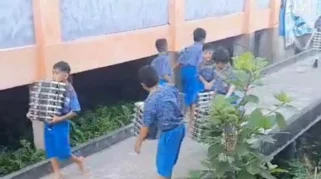 Viral Siswa SD Angkut Ompreng MBG Lewati Jalan Curam, BGN Sumut Beri Teguran